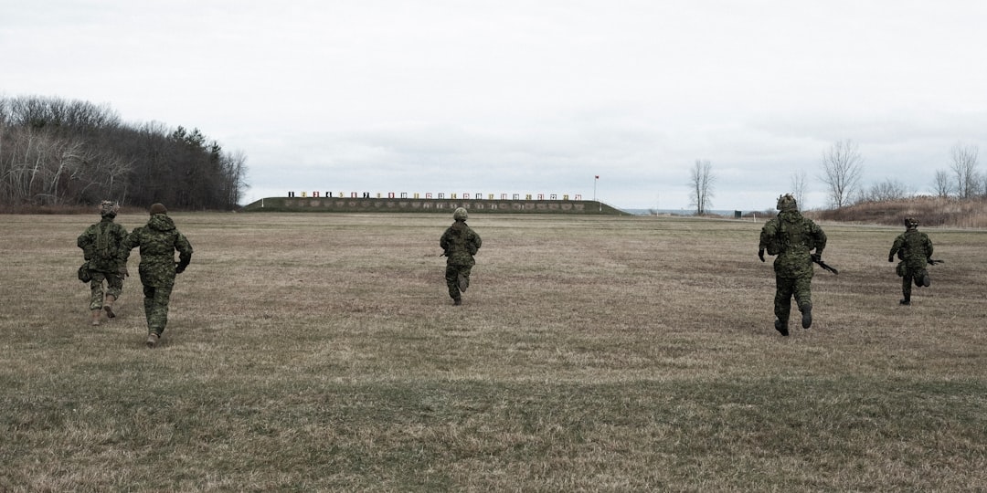 U.S. Army Soldier on a training field representing Army Fitness Test physical standards