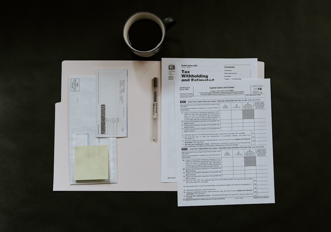 Soldier reviewing pay records at computer